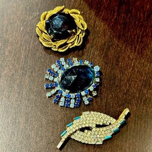 Three vintage beautiful brooches